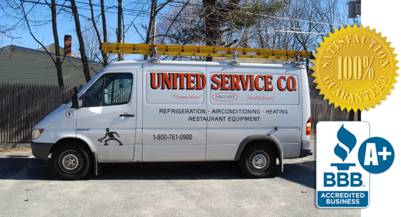 United Service Co truck with award badges, BBB A+ and 100% Satisfaction